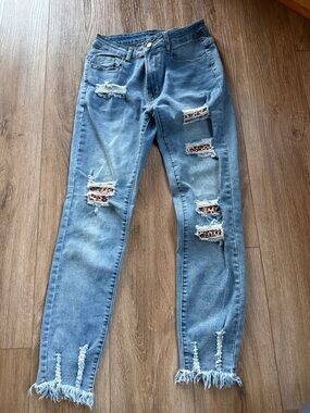 Distressed Light Blue Jeans with Leopard Patch Detail size small
